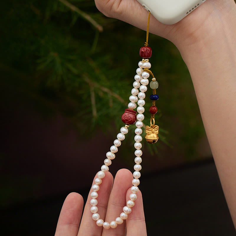 Buddha Stones Perla naturale Cinabro Borsa per soldi Campana Oro Bestia che deglutisce Leone danzante Guarigione Telefono Decorazione appesa