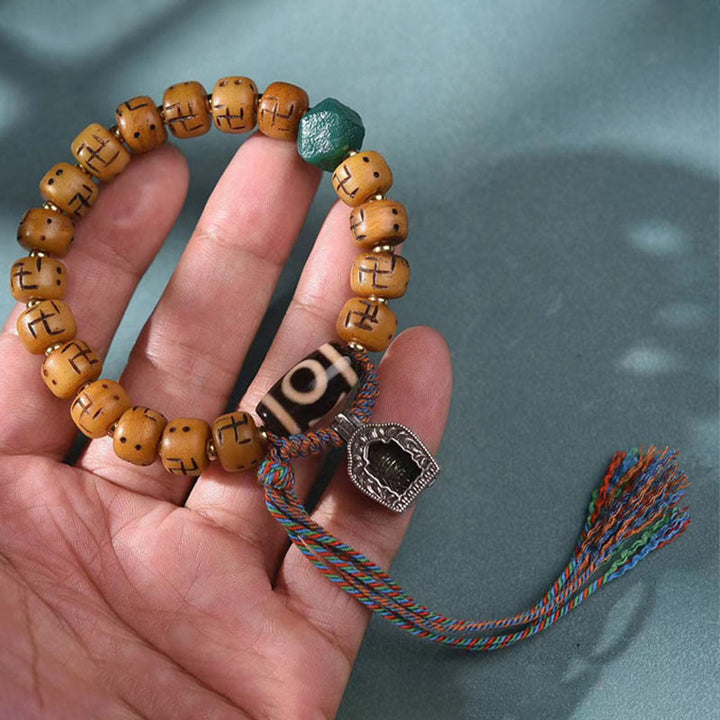 Buddha Stones naturale tibetano osso di cammello svastica Dzi perlina Shankha Buddha fascino Kirtimukha braccialetto con nappa protezione fortuna