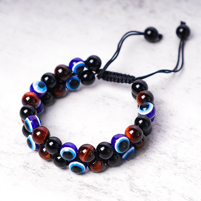 Braccialetto di perline di protezione dell'occhio di tigre con ematite e Buddha Stones