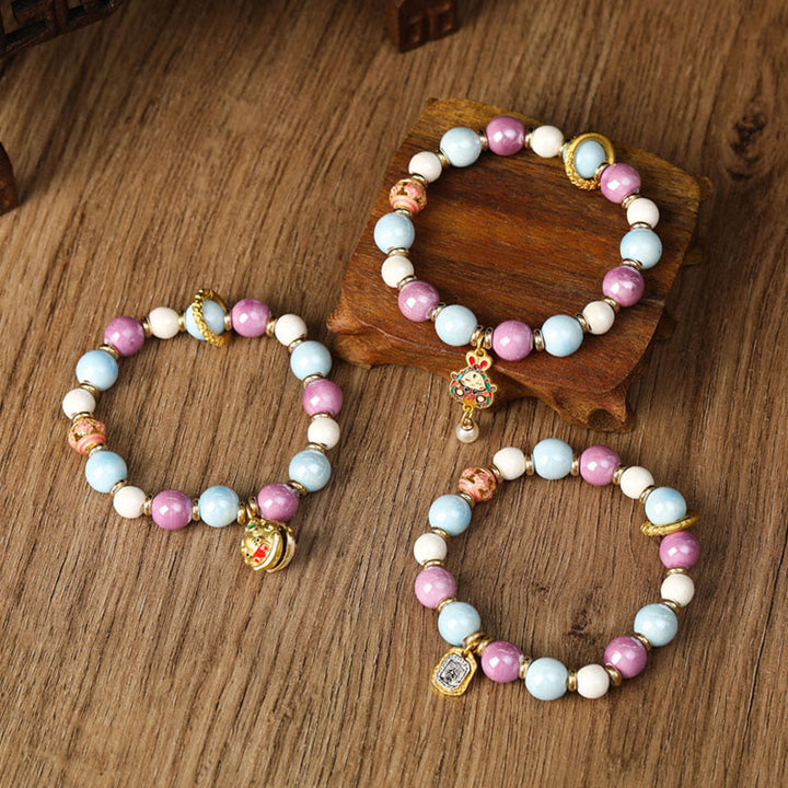 Buddha Stones Tibetano Zakiram Dea della Ricchezza Coniglio Testa di Leone Ciondolo Liuli Vetro Incenso Cenere Perline di Porcellana Braccialetto di Protezione