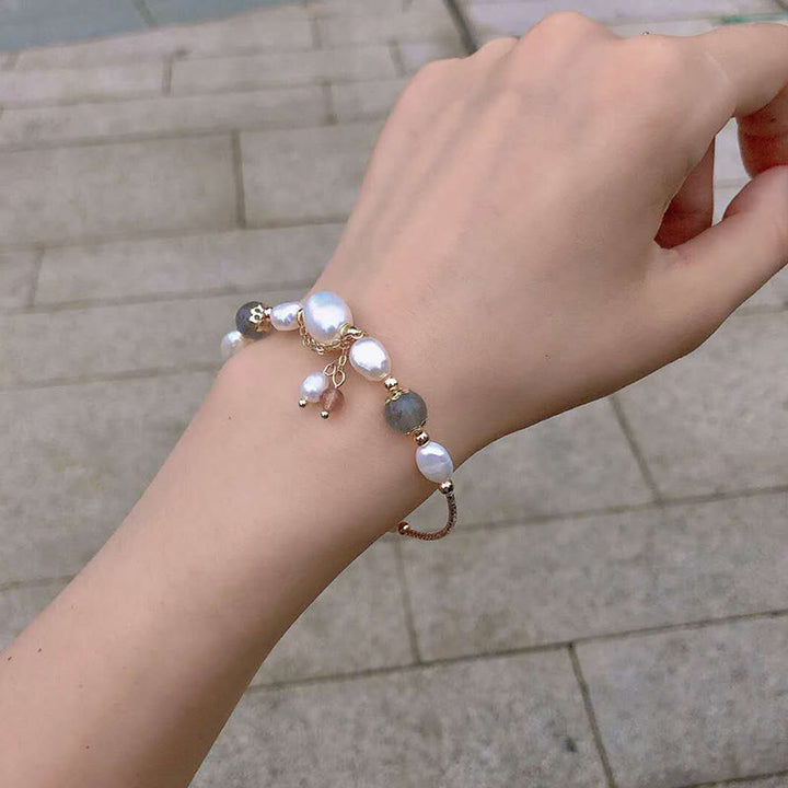 Braccialetto ottimismo con perle di quarzo fragola, pietra di luna e Buddha Stones