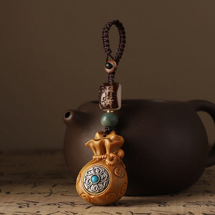 Buddha Stones Piccola foglia Sandalo rosso Sandalo verde Sacchetto di soldi Om Mani Padme Hum Protezione girevole Decorazione appesa