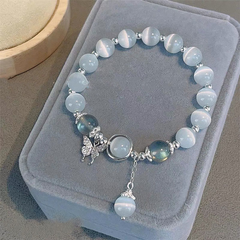 Braccialetto di supporto con ciondolo a forma di stella a forma di farfalla, pietra di luna e occhio di gatto Buddha Stones