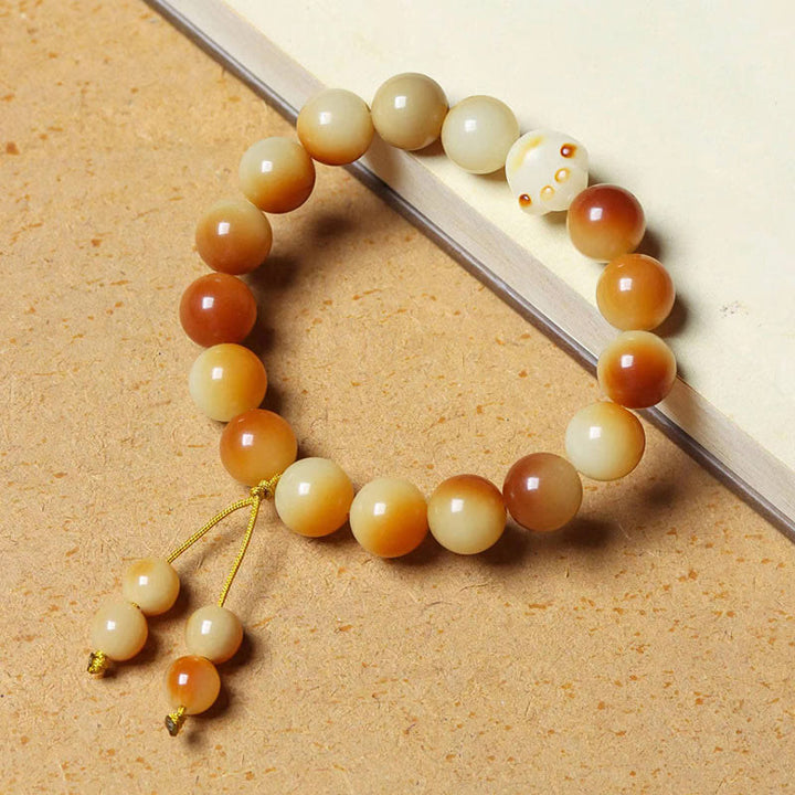 Buddha Stones Semi di Bodhi naturali Braccialetto di saggezza della pace con artigli di zampa adorabile