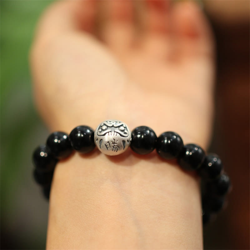 Braccialetto di protezione con perline di onice nero in argento sterling 925 Buddha Stones con incisione del personaggio