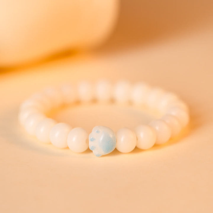 Buddha Stones Semi di Bodhi naturali Zampa adorabile Braccialetto della pace con zampa di gatto fortunato - Blu - image 9