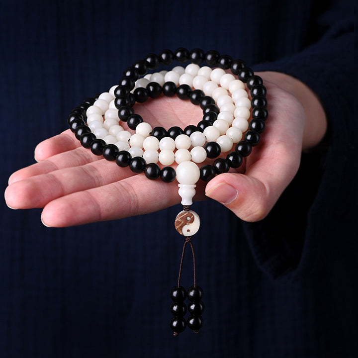 Collana Mala con protezione YinYang in ebano e Buddha Stones