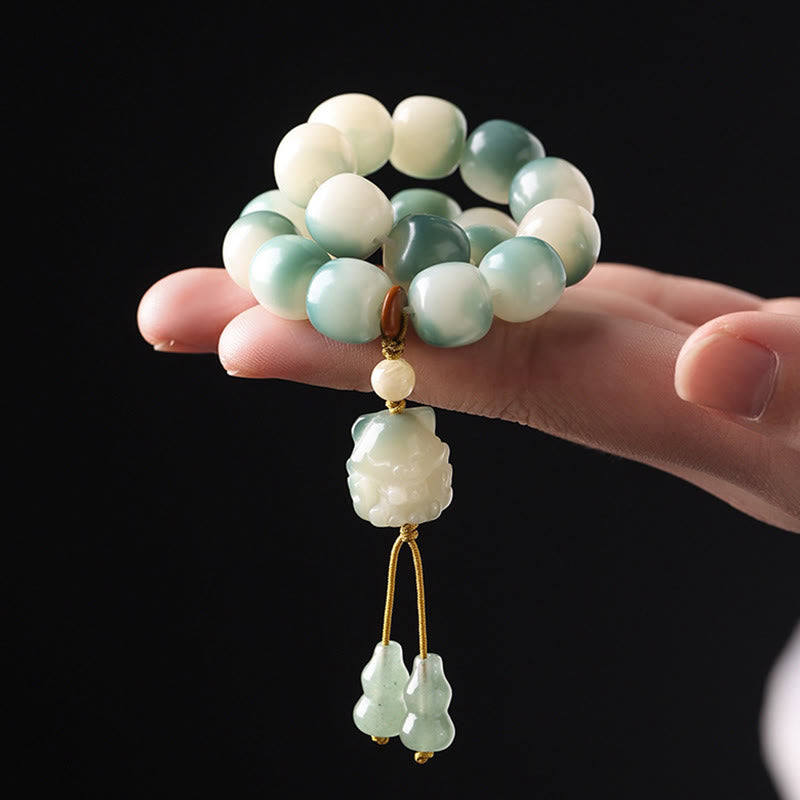 Bracciale della pace Buddha Stones, semi di Bodhi sfumati, volpe a nove code, zampa di gatto, artiglio di pigna - image 4