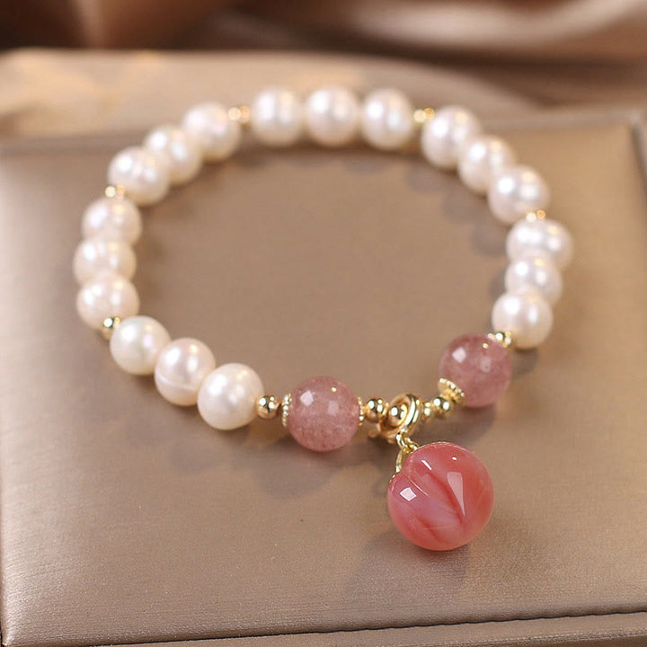Bracciale con ciondolo a forma di cuore, amore, saggezza, perle naturali, quarzo fragola e pesca Buddha Stones
