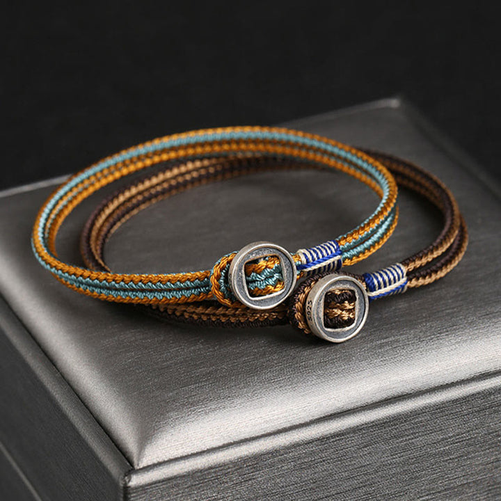 Braccialetto con cordino intrecciato di protezione con bottone fatto a mano in argento sterling 925 Buddha Stones