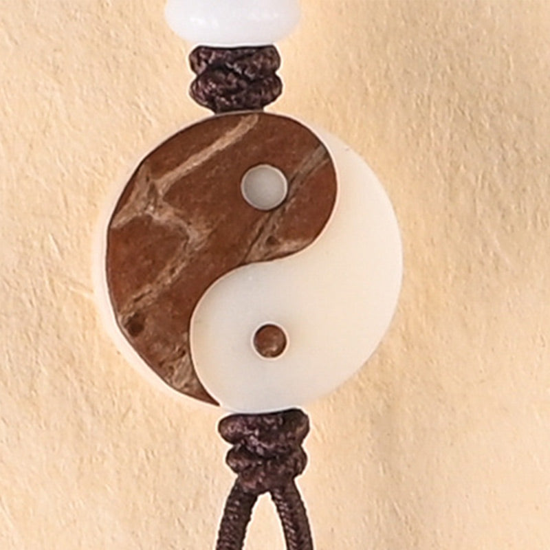 Collana Mala con protezione YinYang in ebano e Buddha Stones