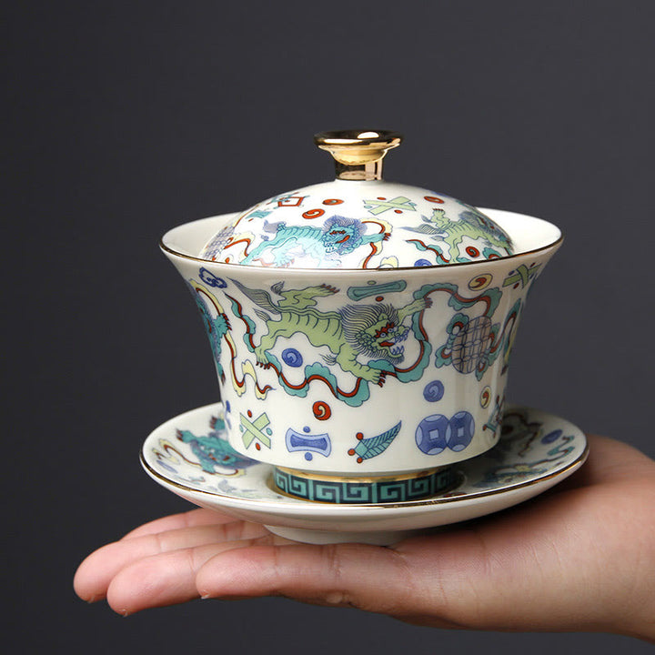 Buddha Stones Retro Prugna Fiore Pino Bambù Fenice Kirin Ceramica Gaiwan Sancai Tazza da tè Kung Fu Tazza da tè e piattino con coperchio