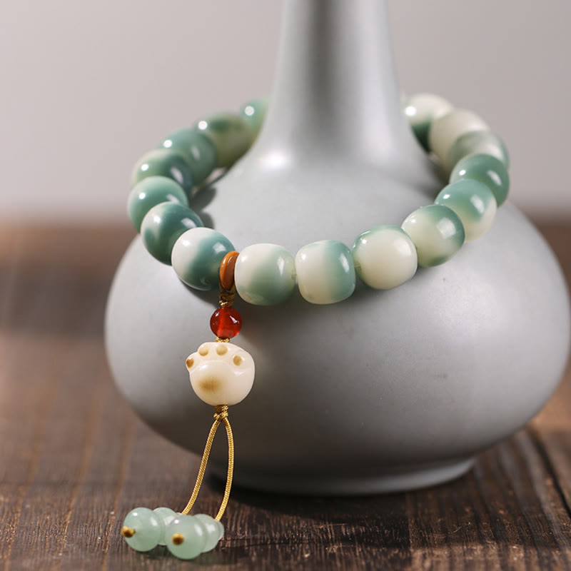 Bracciale della pace Buddha Stones, semi di Bodhi sfumati, volpe a nove code, zampa di gatto, artiglio di pigna - Zampa di gatto bianca (circonferenza del polso 16-17 cm) - image 15