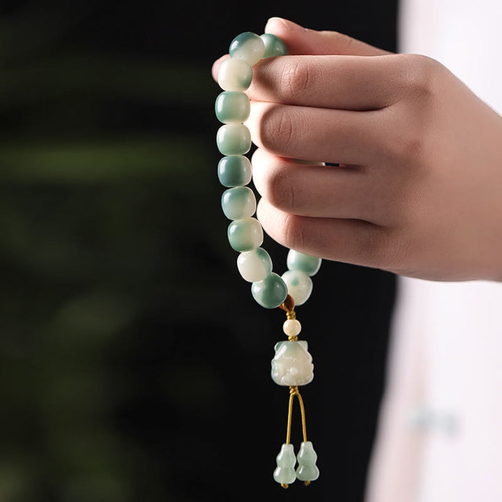 Bracciale della pace Buddha Stones, semi di Bodhi sfumati, volpe a nove code, zampa di gatto, artiglio di pigna - image 10