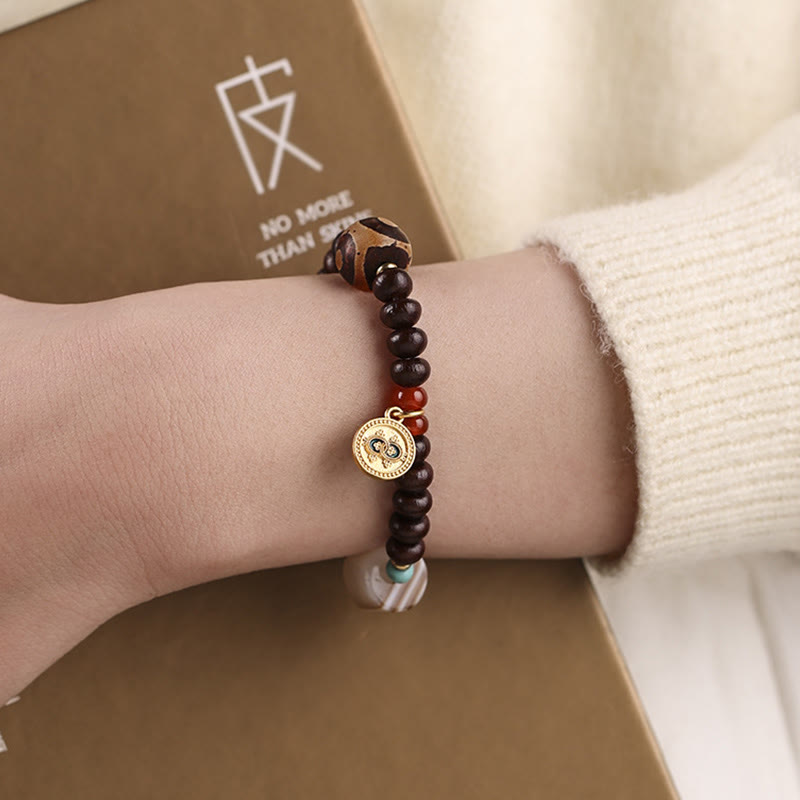 Buddha Stones naturali Tibet viola Bodhi Seed Dzi Bead Dio della ricchezza braccialetto di saggezza