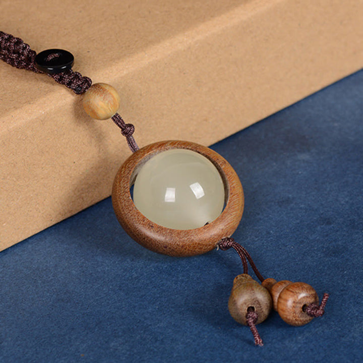 Buddha Stones Sandalo rosso Legno di ebano Sandalo verde Perlina portafortuna luminosa Zucca Portachiavi della pace