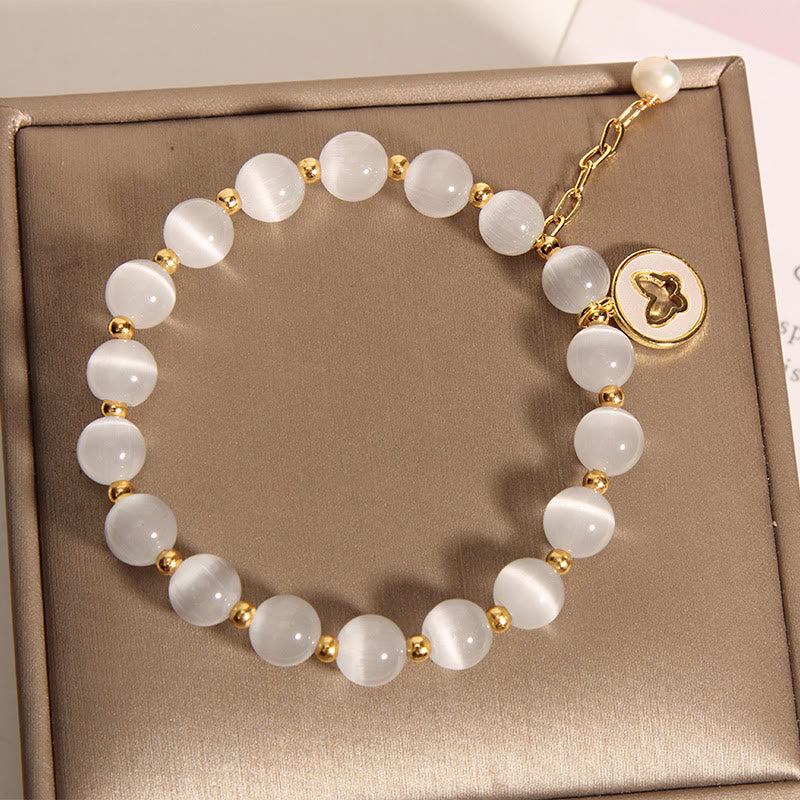Braccialetto dell'amore con ciondolo a farfalla con occhio di gatto Buddha Stones