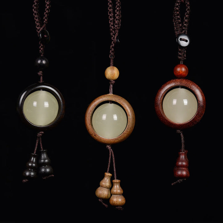 Buddha Stones Sandalo rosso Legno di ebano Sandalo verde Perlina portafortuna luminosa Zucca Portachiavi della pace