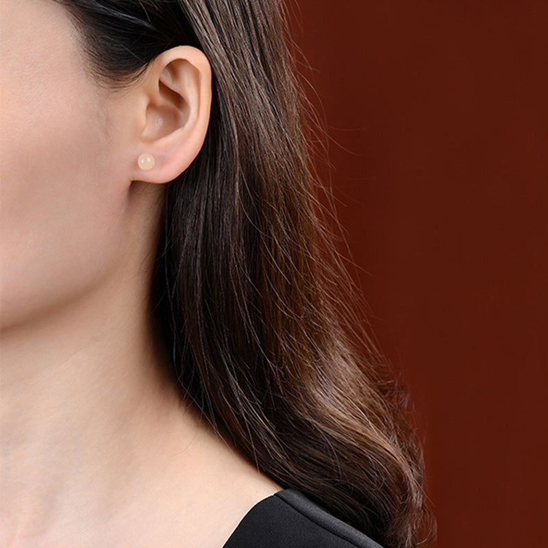 Orecchini a bottone rotondi in giada bianca con Buddha Stones in argento sterling 925