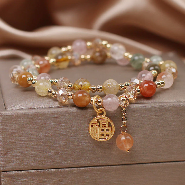 Braccialetto di auspicio con carattere Fu in quarzo rutilato multicolore Buddha Stones