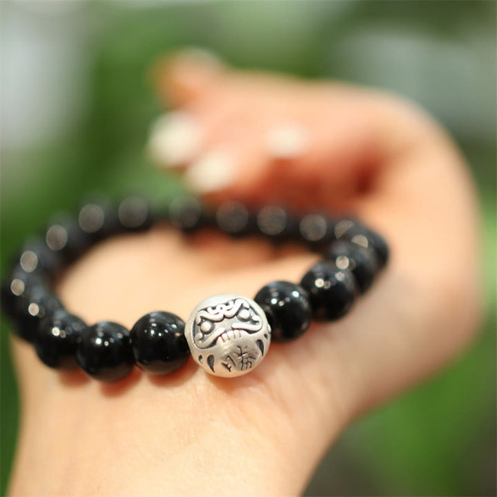 Braccialetto di protezione con perline di onice nero in argento sterling 925 Buddha Stones con incisione del personaggio