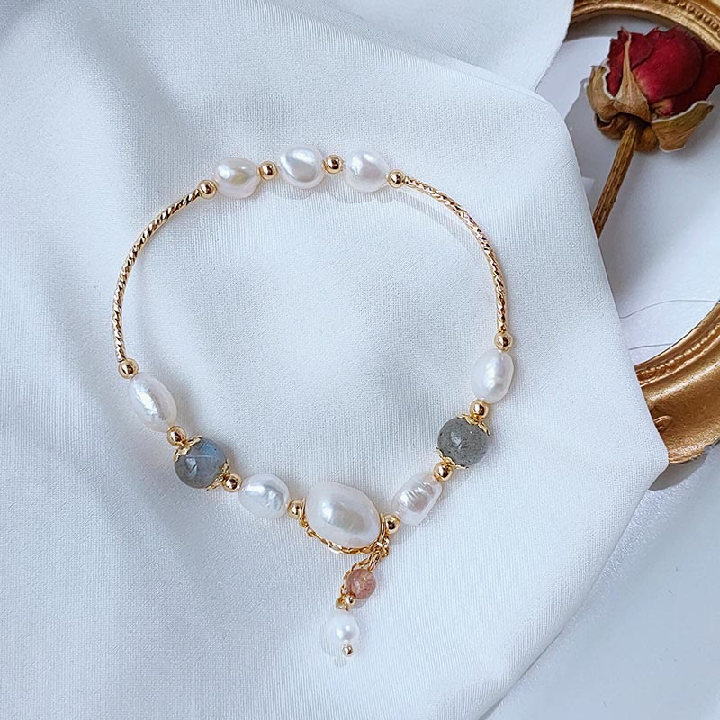 Braccialetto ottimismo con perle di quarzo fragola, pietra di luna e Buddha Stones