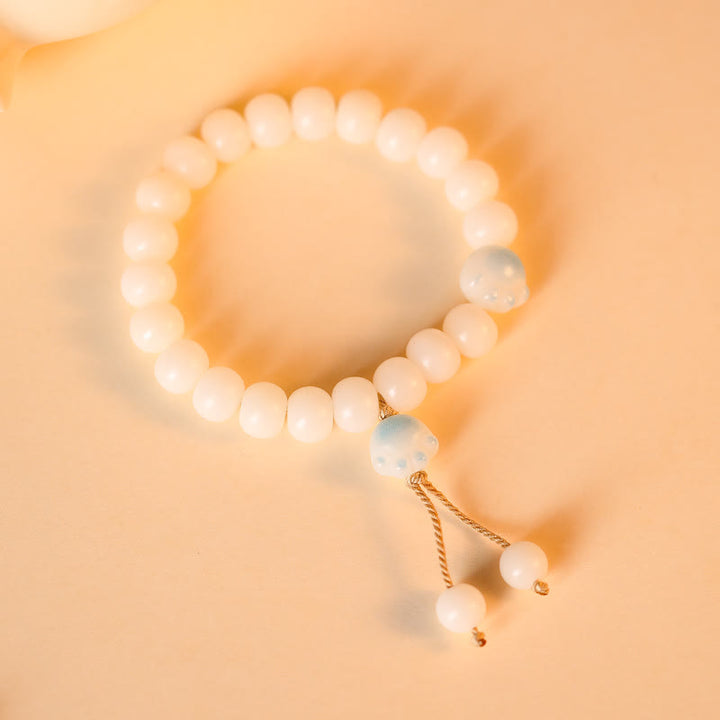 Buddha Stones Semi di Bodhi naturali Zampa adorabile Braccialetto della pace con zampa di gatto fortunato - Stringa blu - image 10