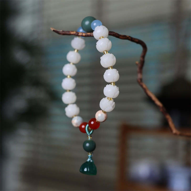 Braccialetto di armonia di pace intagliato con Buddha Stones