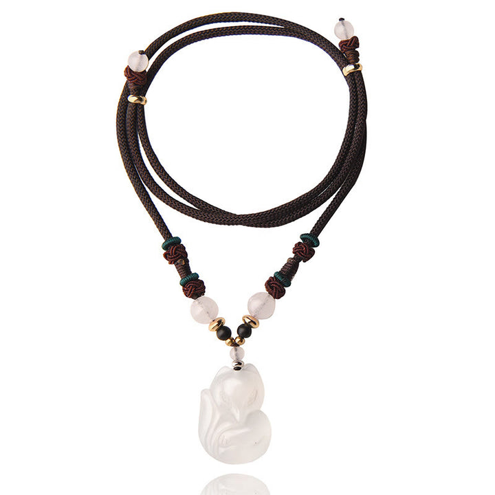Collana con ciondolo in corda dell'armonia con perline di cristallo rosa di volpe e calcedonio Buddha Stones