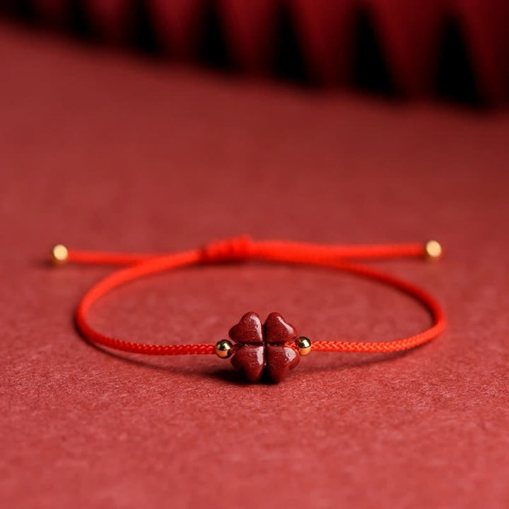 Buddha Stones Cinabro naturale Quadrifoglio Benedizione Braccialetto con corda rossa Cavigliera