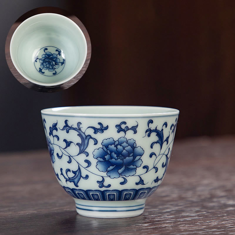 Buddha Stones Paesaggio blu Montagne Loto Gatto carino Padiglioni Magnolia Canna Aironi Tazza da tè in ceramica Piccola tazza da tè Kung Fu