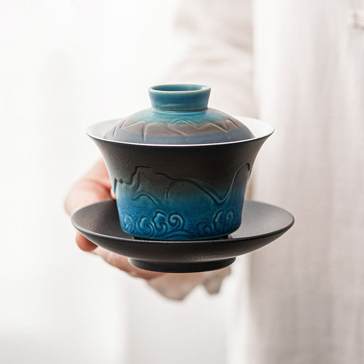 Buddha Stones Retro Blu Oceano Mare Onde Gradiente Ceramica Gaiwan Sancai Tazza da Tè Kung Fu Tazza da Tè e Piattino con Coperchio