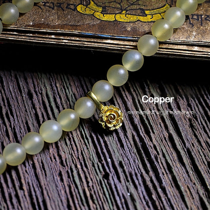 Braccialetto della fortuna in ambra e corno di pecora del Tibet con 108 perle di Mala Buddha Stones
