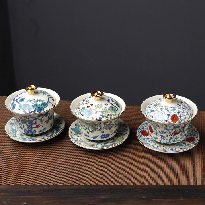 Buddha Stones Retro Prugna Fiore Pino Bambù Fenice Kirin Ceramica Gaiwan Sancai Tazza da tè Kung Fu Tazza da tè e piattino con coperchio