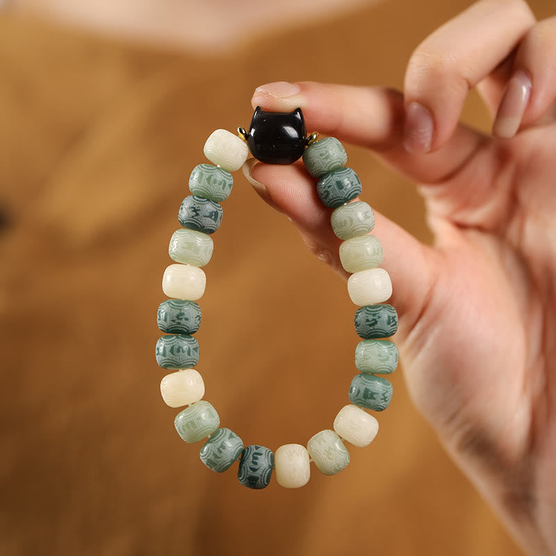 Buddha Stones Semi di Bodhi Argento Lucentezza Ossidiana Testa di Gatto Om Mani Padme Hum Braccialetto Armonia Inciso - Seme di Bodhi verde (circonferenza del polso 14-16 cm) - image 8