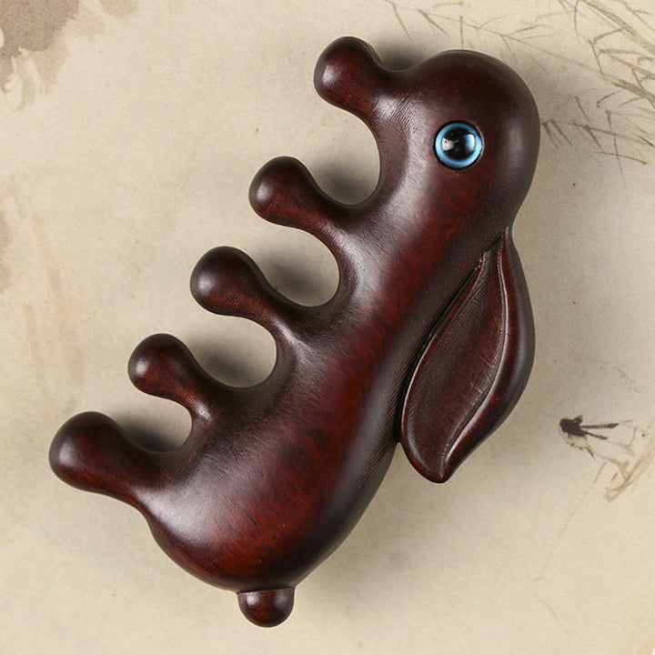 Pettine per massaggio rilassante con coniglietto di sandalo rosso a foglia piccola e sandalo verde