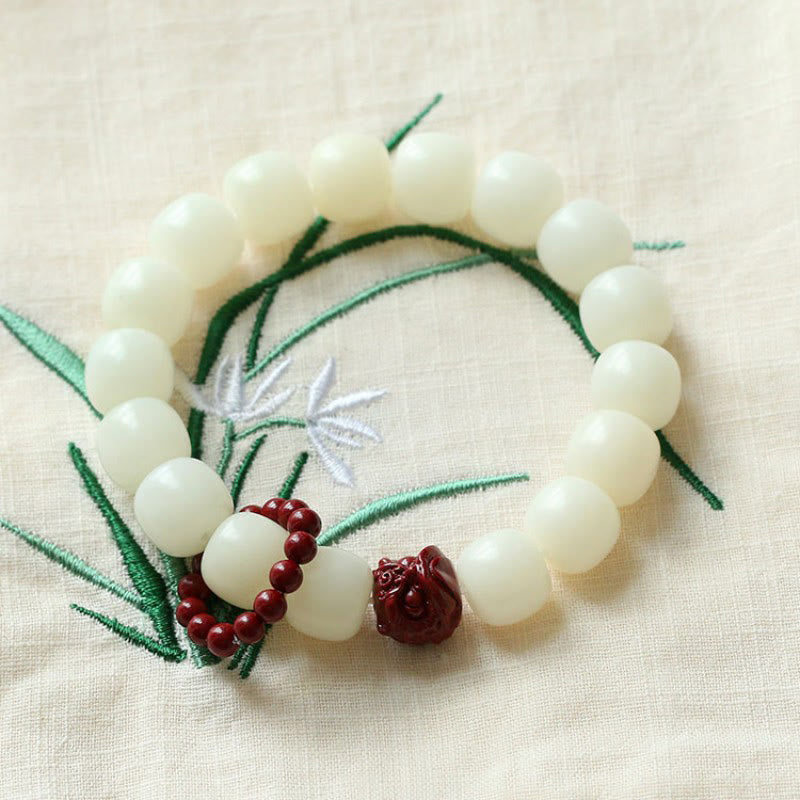 Buddha Stones Semi di Bodhi naturale Cinabro Leone danzante Charm Saggezza Armonia Polso Mala