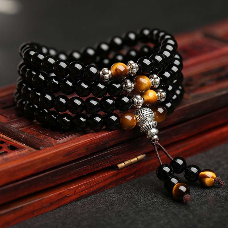 Bracciale Mala di benedizione con occhio di tigre e ossidiana nera Buddha Stones