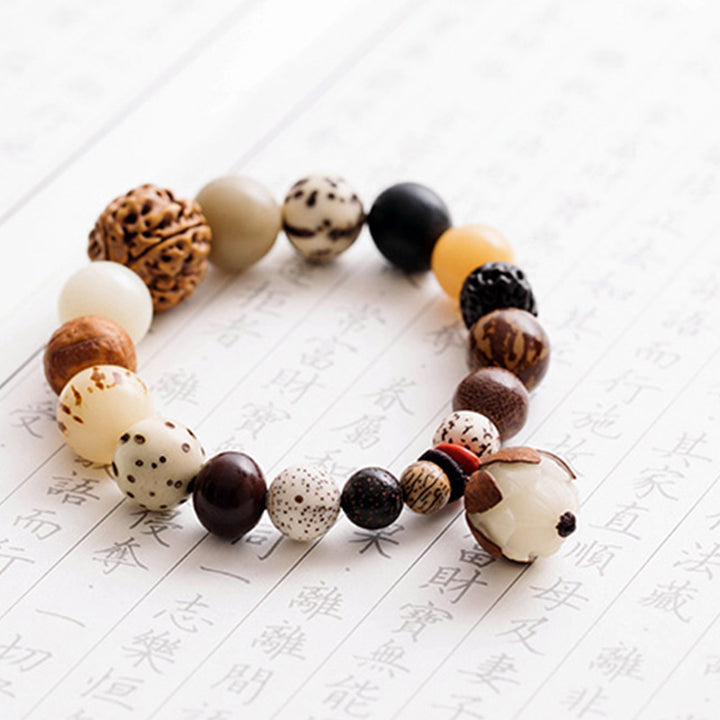 Bracciale Mala da polso Buddha Stones, semi di Bodhi, loto, saggezza, pace