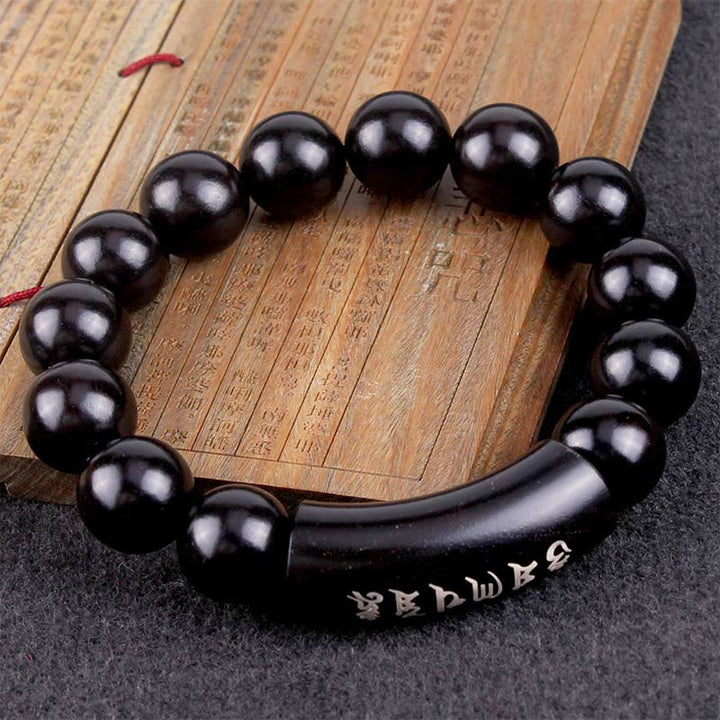 Bracciale intarsiato in legno di ebano con Buddha Stones in argento sterling 999 Om Mani Padme Hum