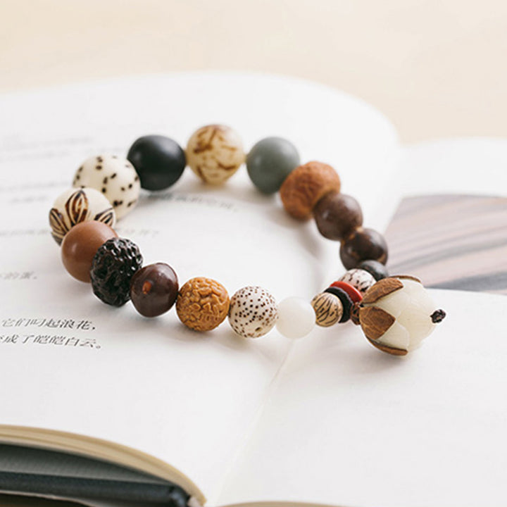 Bracciale Mala da polso Buddha Stones, semi di Bodhi, loto, saggezza, pace