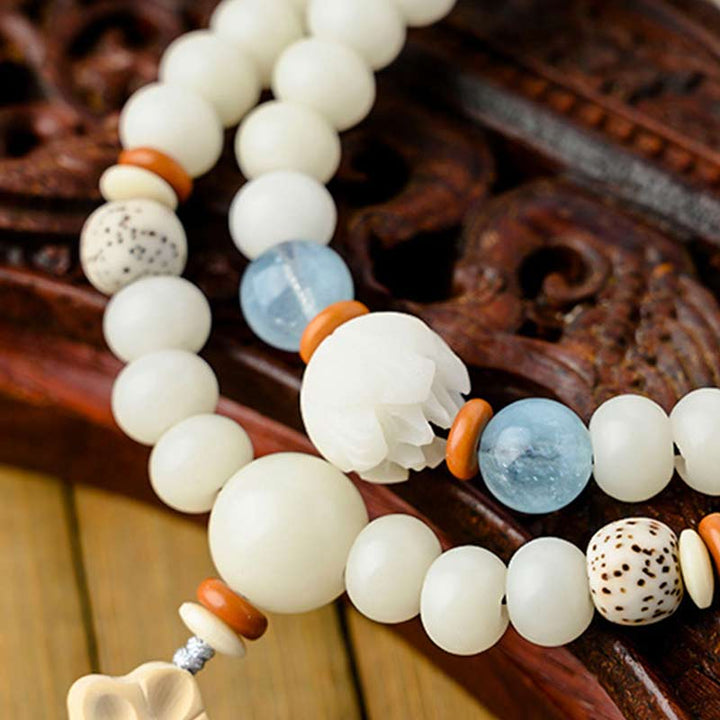 Braccialetto di benedizione del loto Bodhi in giada bianca tibetana Buddha Stones