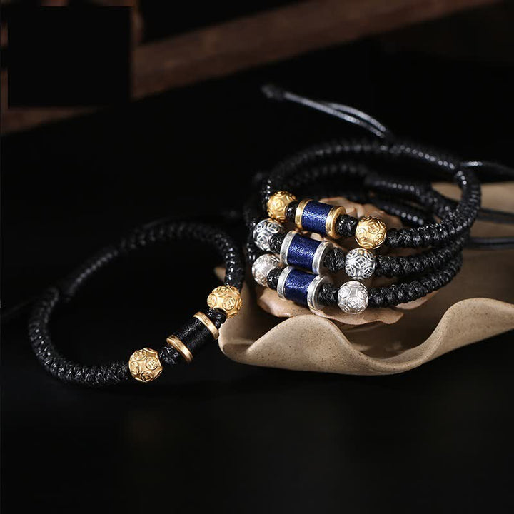 Braccialetto in corda intrecciata con perline di rame in argento sterling 999 Buddha Stones