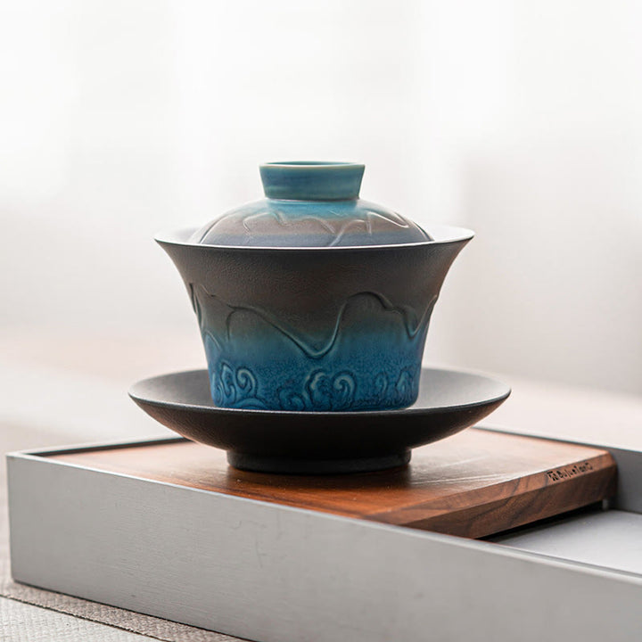 Buddha Stones Retro Blu Oceano Mare Onde Gradiente Ceramica Gaiwan Sancai Tazza da Tè Kung Fu Tazza da Tè e Piattino con Coperchio