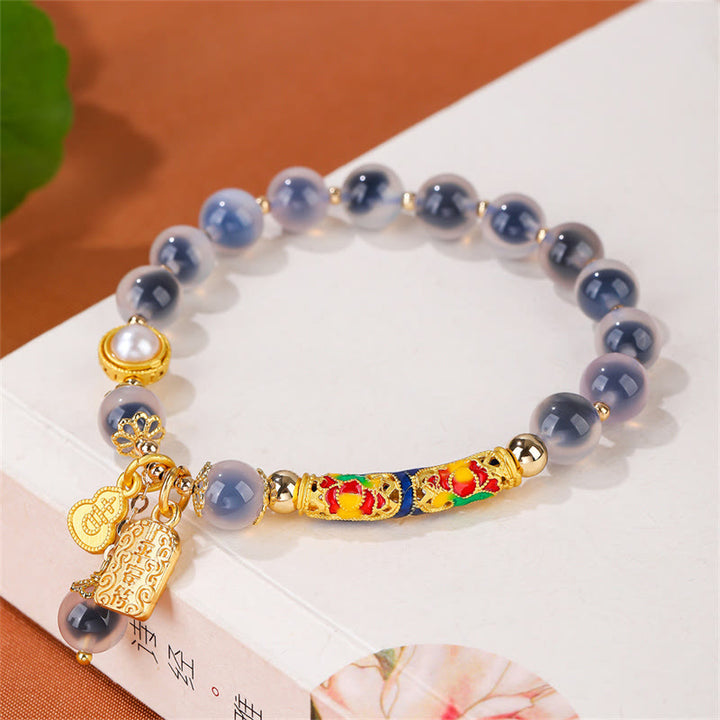 Braccialetto di forza con amuleto in agata blu caramella naturale Buddha Stones