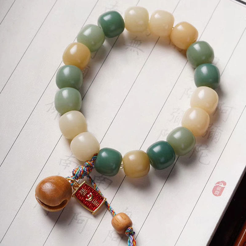 Braccialetto con ciondolo a tamburo di pesce in legno con semi di Bodhi e Buddha Stones, sfumatura naturale