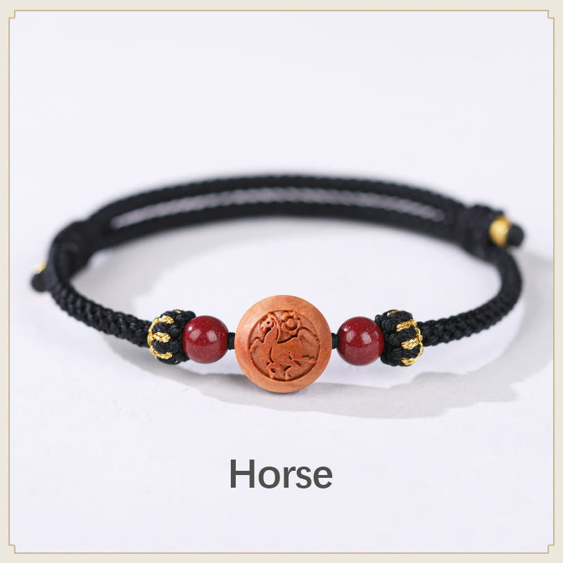 Braccialetto della ricchezza in cinabro intagliato con carattere dello zodiaco cinese Fu in legno di pesca naturale Buddha Stones