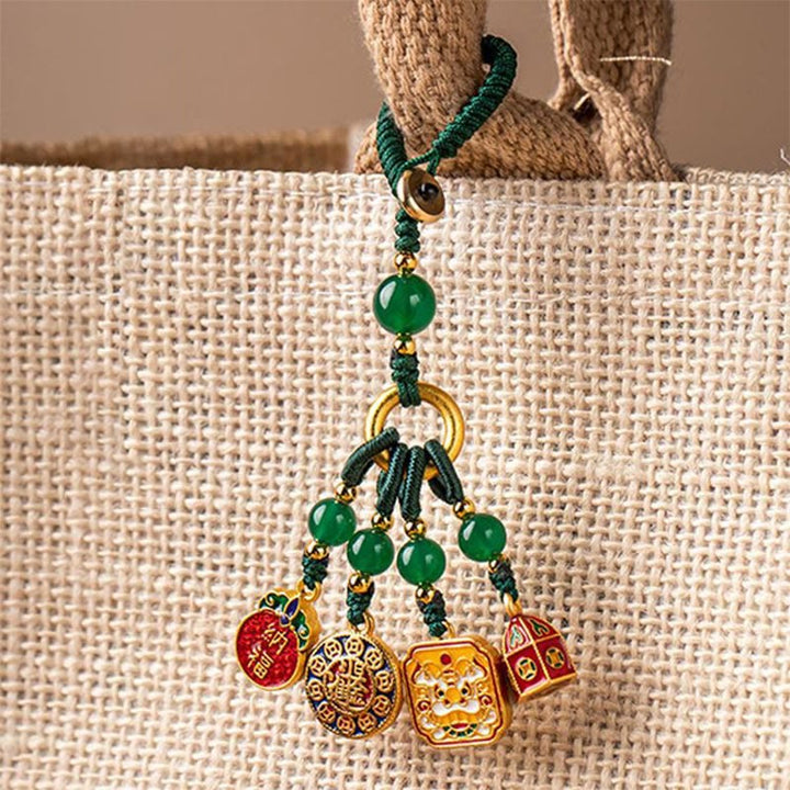 Buddha Stones Niente di cui essere superstiziosi Leone danzante Rame Ricchezza Portachiavi