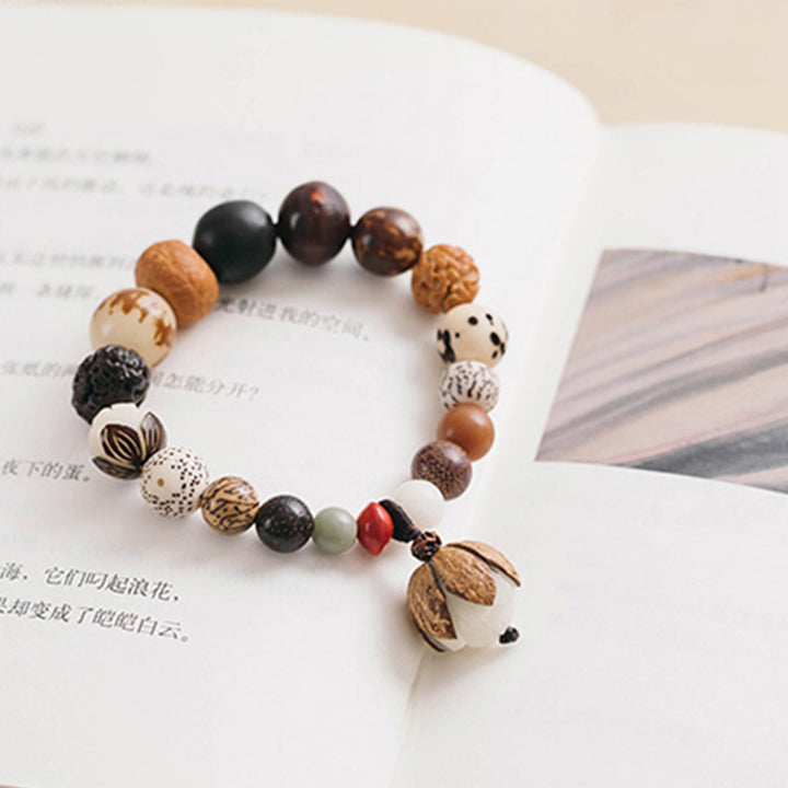 Bracciale Mala da polso Buddha Stones, semi di Bodhi, loto, saggezza, pace