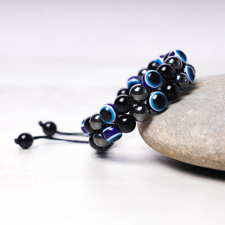 Braccialetto di perline di protezione dell'occhio di tigre con ematite e Buddha Stones